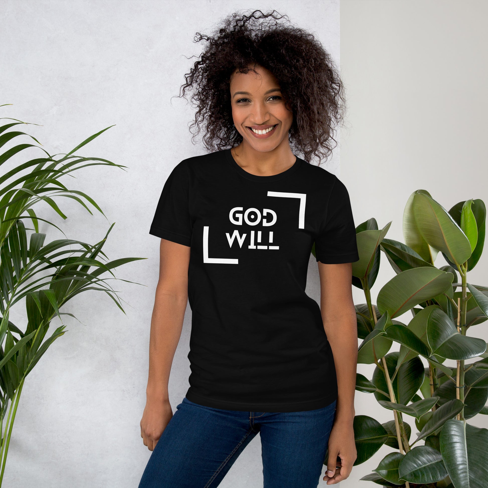 Female wearing black shirt that has God Will graphics front of shirt